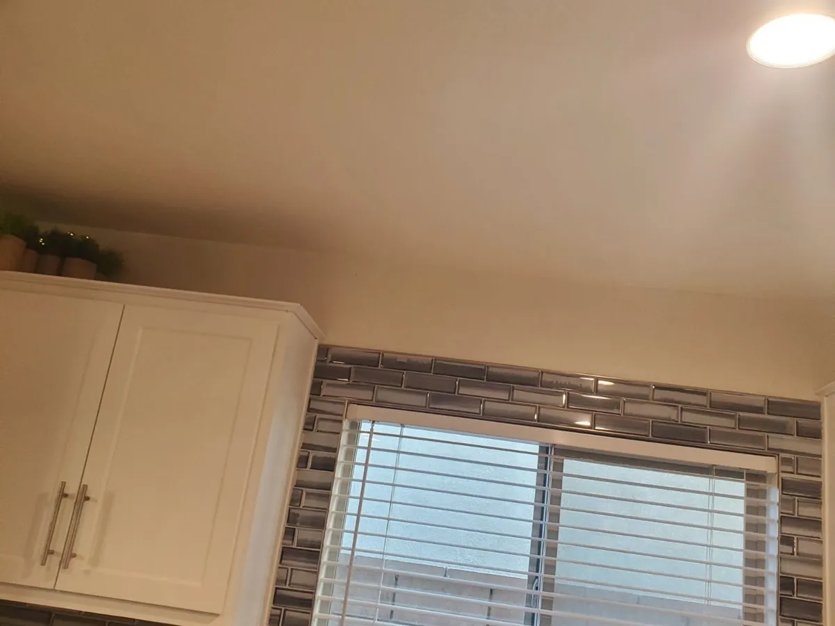Custom kitchen cabinetry and backsplash